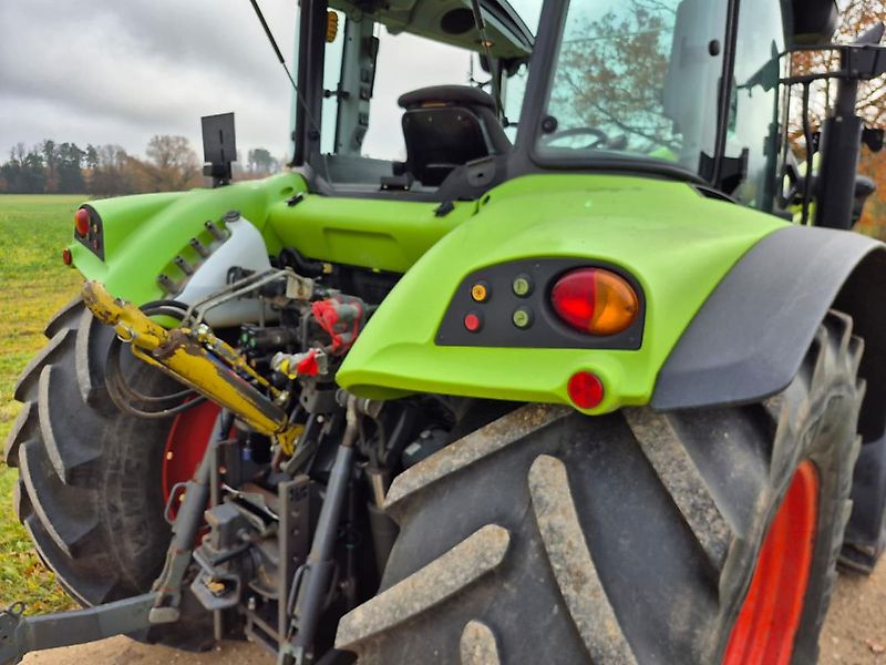 Claas ARION 460 CIS mit Frontlader